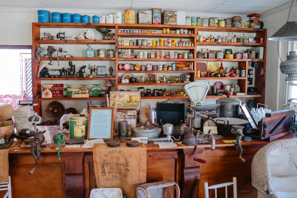 Bench and shelves containing vintage items