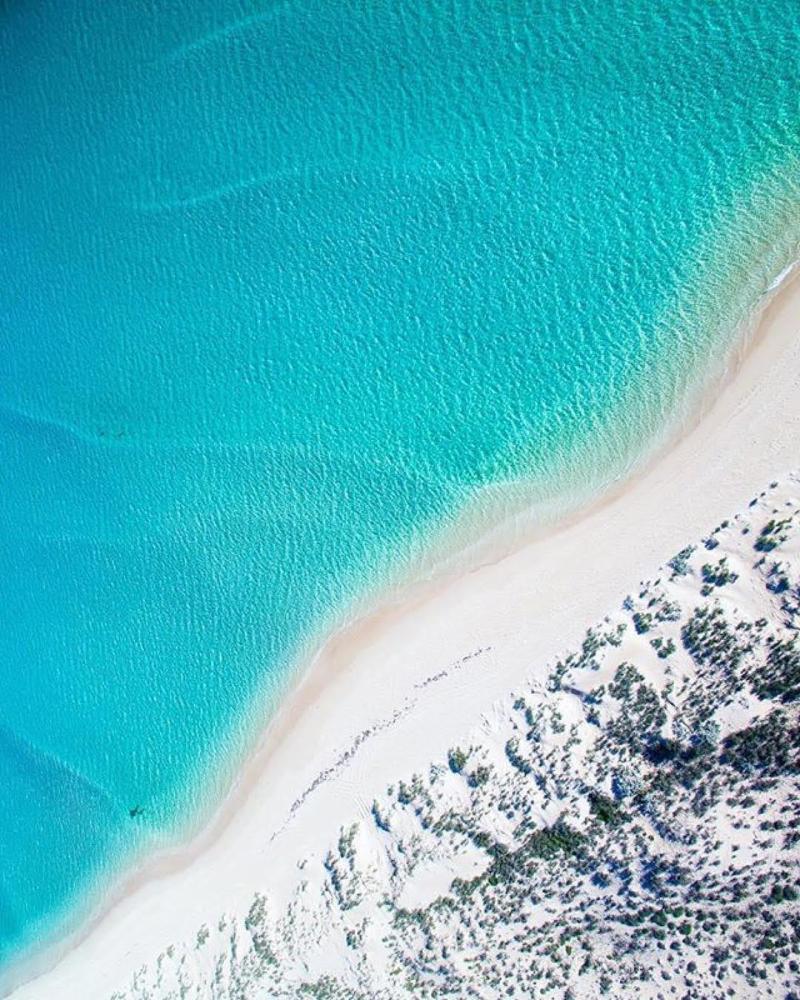 Aerial view of beach with turquoise water