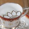 Moustache lidded tea cup and saucer