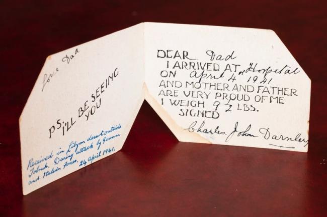 Newborn’s arrival card on the frontlines of war