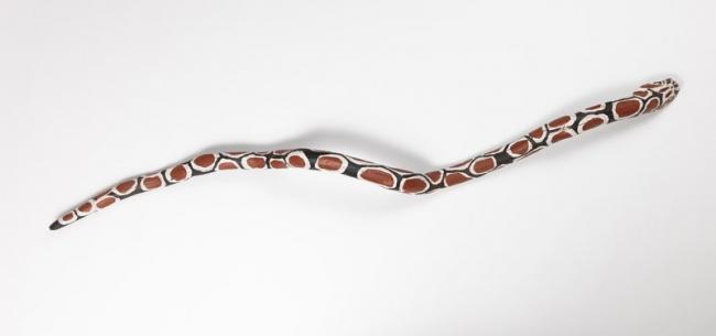 Giant camouflaged snake