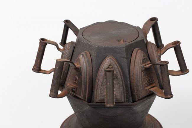 A miniature iron-heating factory